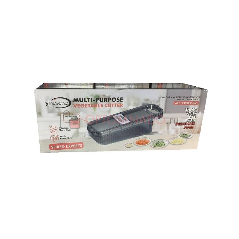 Multifunktionell grönsaksskärare med behållare